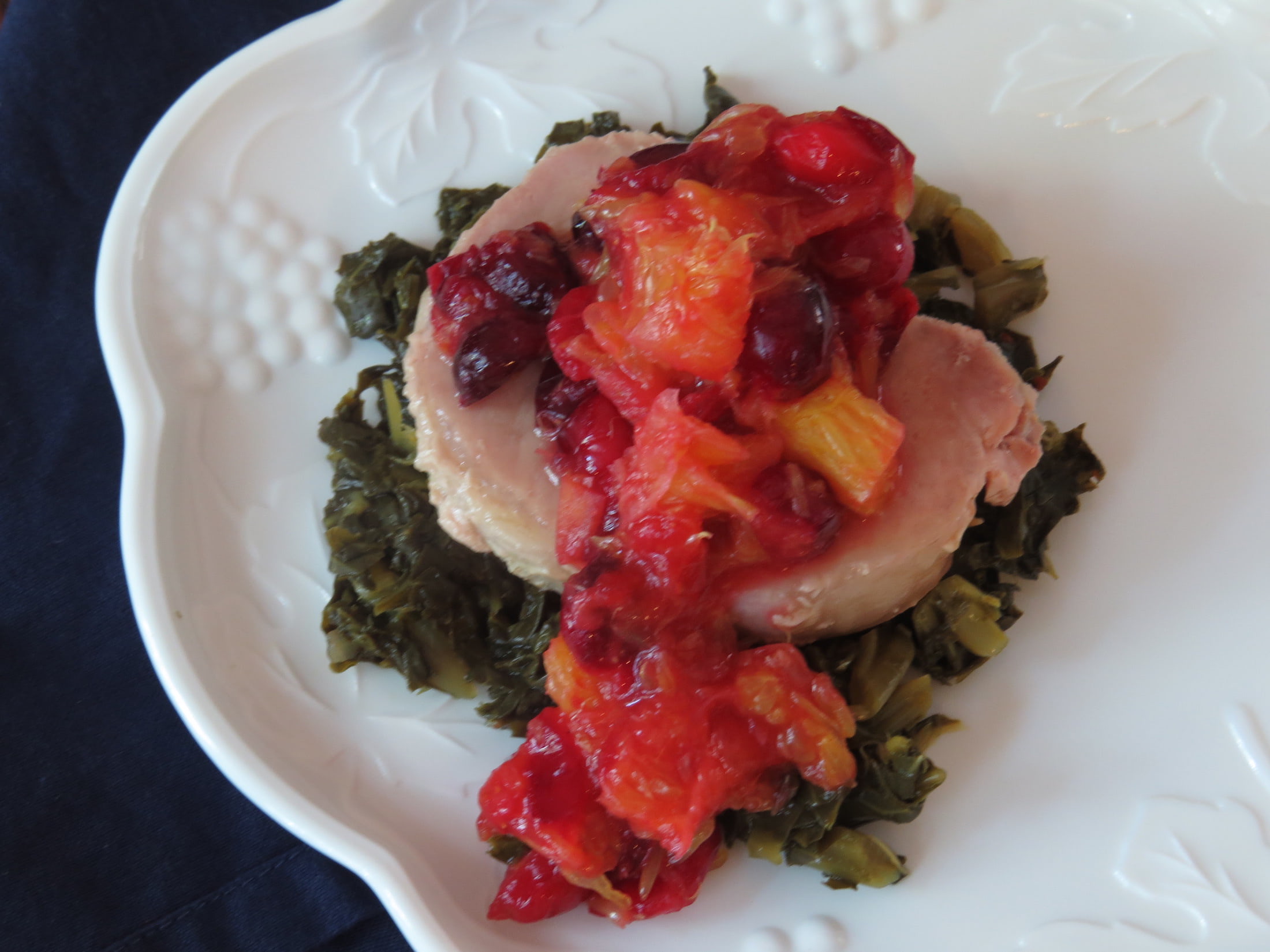 Pork-Chops-with-Cranberry-Orange-Sauce-over-Collards